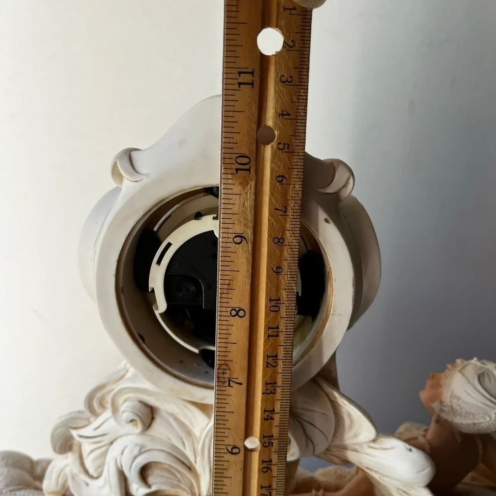 Elegant Cream Clock with Reclining Lady Figurine
